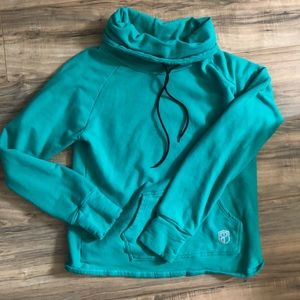 Born Primitive teal sweatshirt with thumb holes